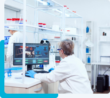 Laboratory with a woman working at a workstation